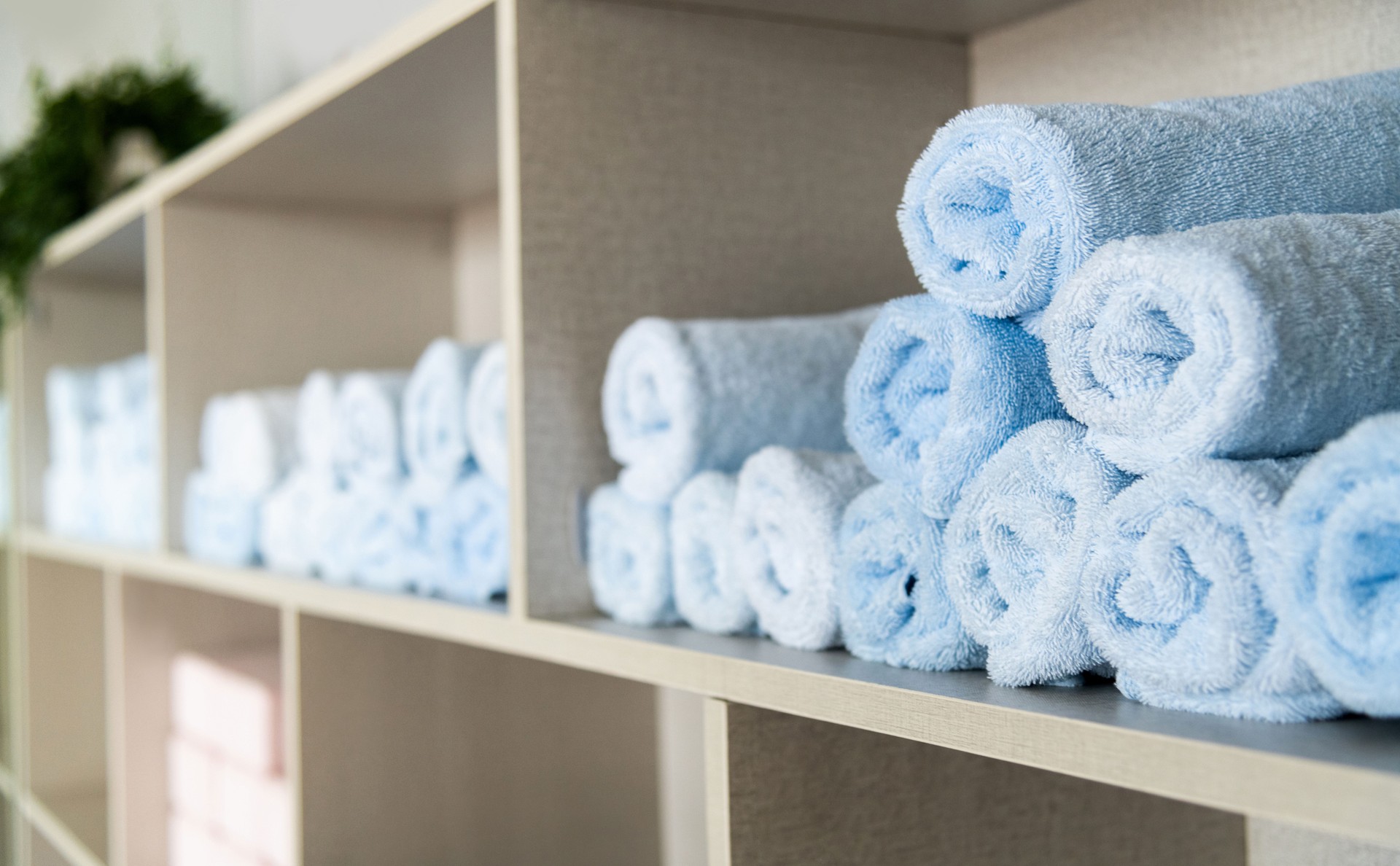 Blue towels in the shelf